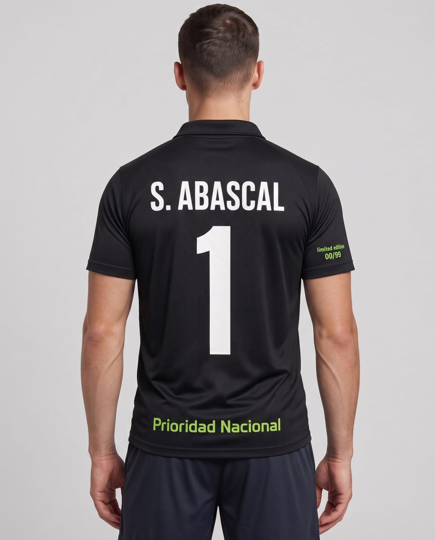 Back view wearing the black Real Madrid shirt, with the name S. Abascal and the number 1