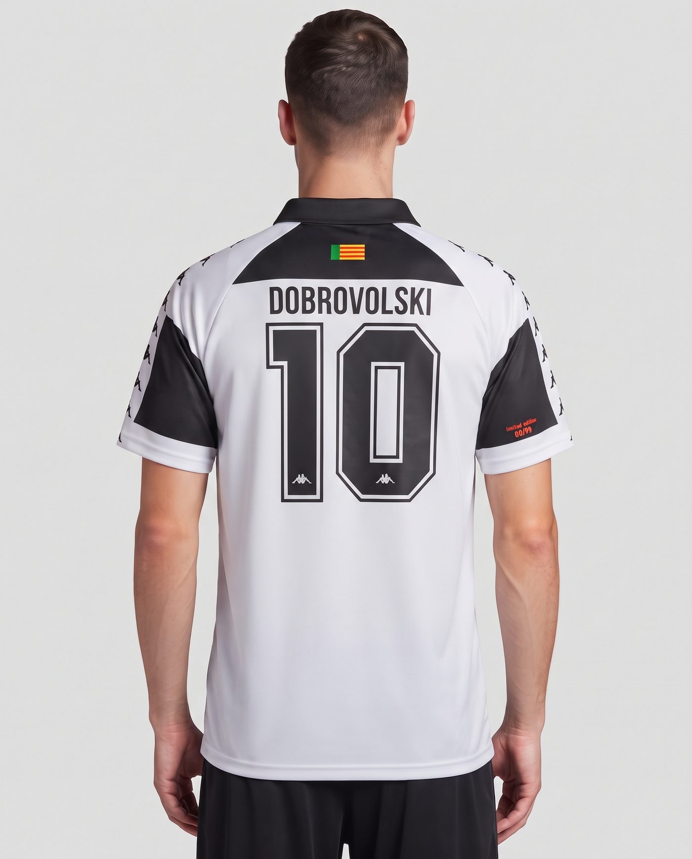 Back view wearing the white and black Castellón shirt, with the name Dobrovolski and the number 10