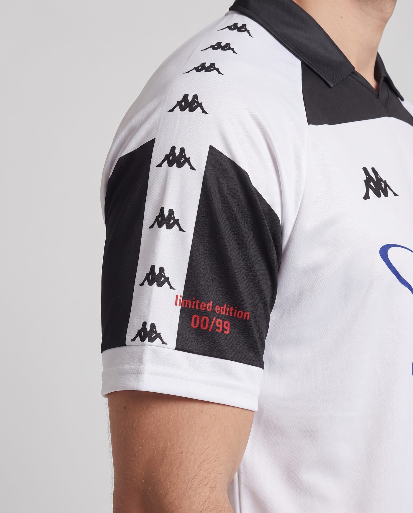 Close-up of the right sleeve of the white and black Dobrovolski 10 shirt