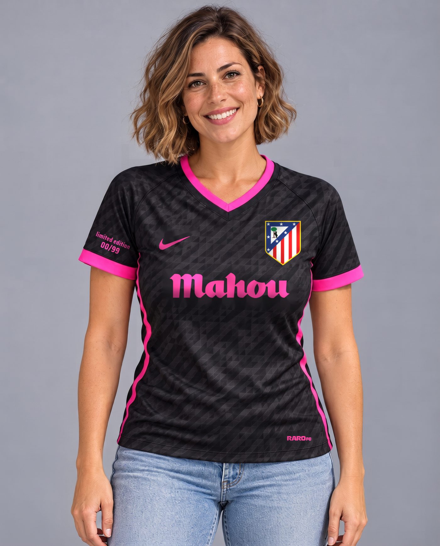 Front view wearing the women's black and pink Atlético Llorente 14 shirt