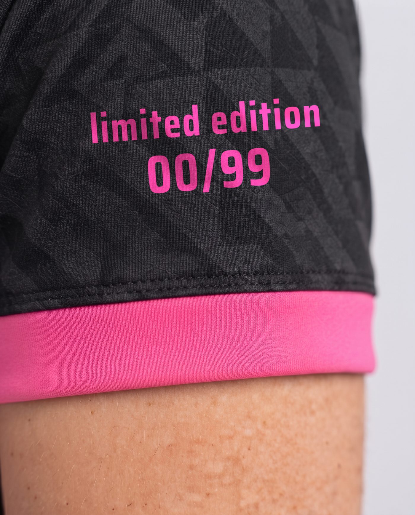 Close-up of the limited edition numbering on the sleeve of the Llorente 14 shirt