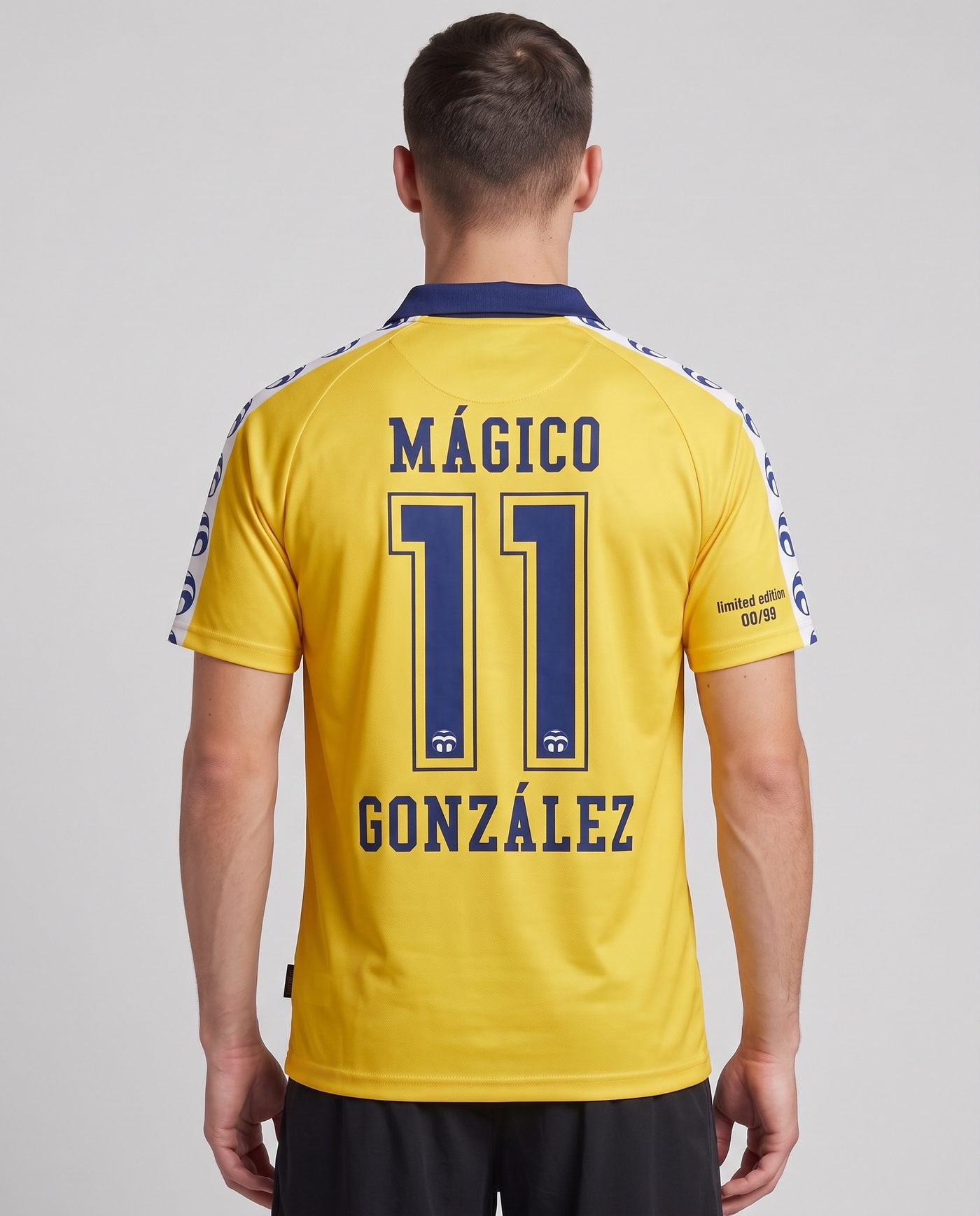 Back view wearing the yellow Cádiz shirt, with the name Mágico and the number 11
