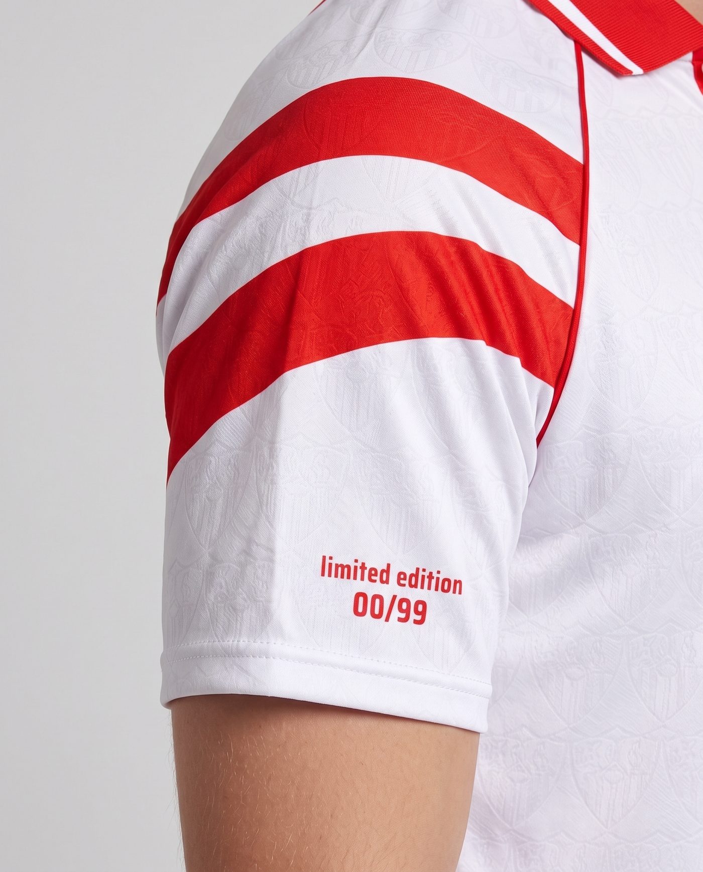 Close-up of the right sleeve of the white Maradona 10 shirt